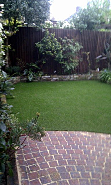 artifical-lawn-brick-patio-london-stock-raised-beds-mixed-planting-blahm-clapham-london.jpg