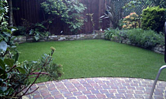 wave-brick-patio-london-paving-company-fake-grass-easy-lawn-anewgarden.jpg