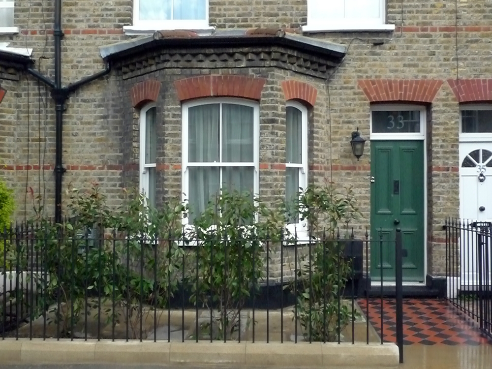 metal-rails-and-gate-reclaimed-yorkstone-paving-mosaic-tiles-london.JPG