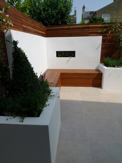 built in bench rendered walls and small london garden design dulwich