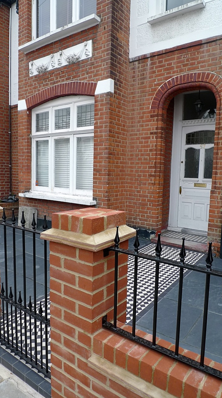 red imperial london brick wall blue black slate paving black and white victorian mosaic tile path metal rail and gate (10)