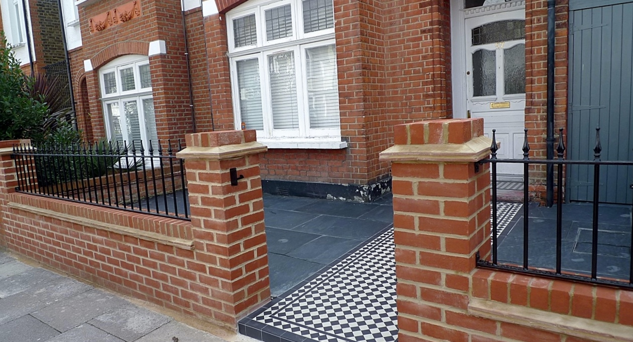 red imperial london brick wall blue black slate paving black and white victorian mosaic tile path metal rail and gate (2)