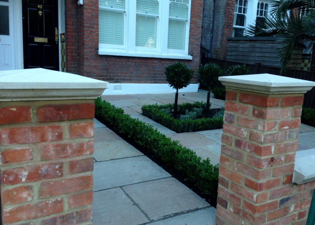 Imperial red brick London wall stone pier caps sandstone paving and