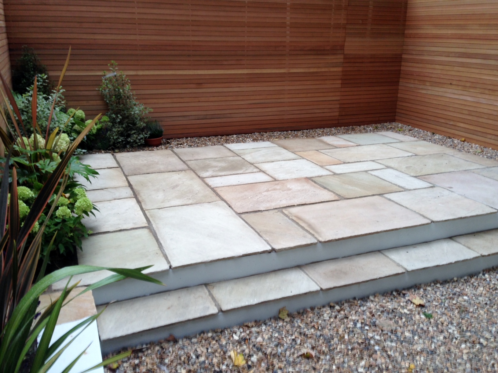 clapham garden design sandstone paving hardwood privacy screen shingle trellis fence modern low maintenance ideas (11)
