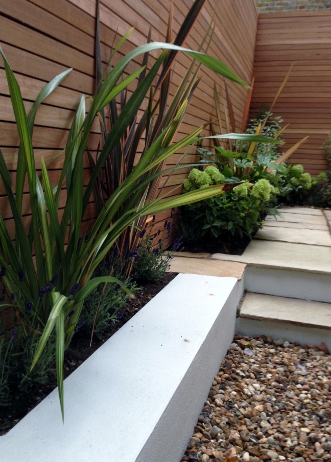 clapham garden design sandstone paving hardwood privacy screen shingle trellis fence modern low maintenance ideas (18)