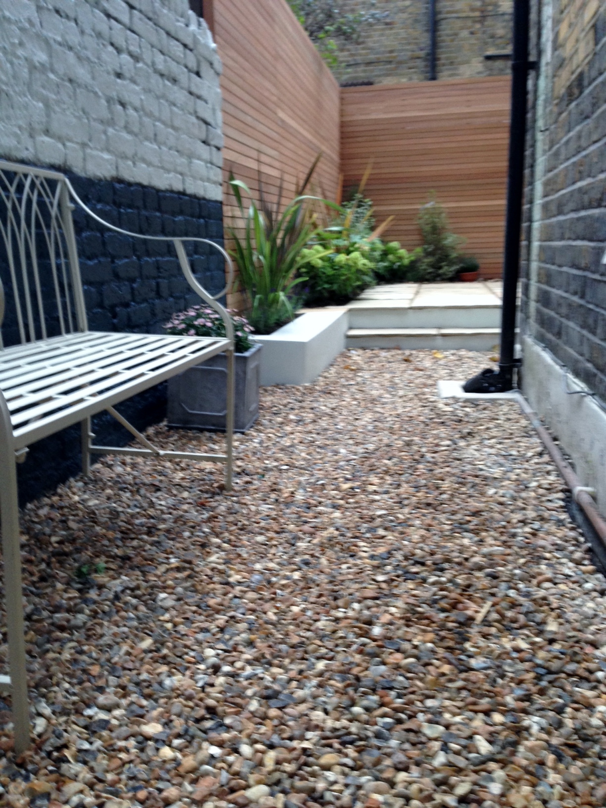 clapham garden design sandstone paving hardwood privacy screen shingle trellis fence modern low maintenance ideas (7)