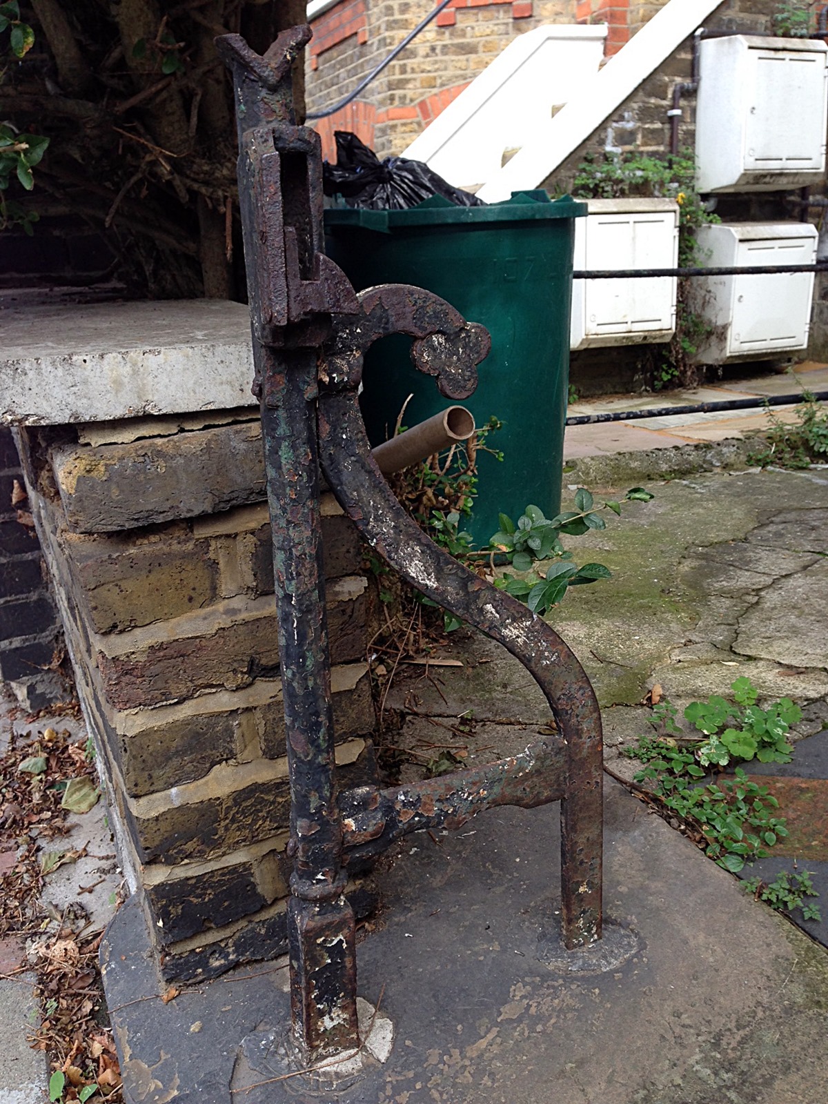 victorian original wrought iron roll back gate with old York stone quarry tile path and original London Stock brick wall Putney West Hill London (1)