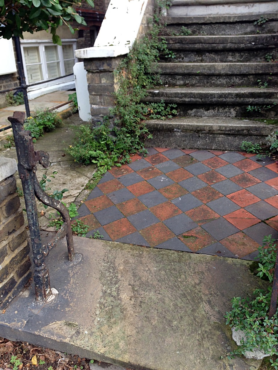 victorian original wrought iron roll back gate with old York stone quarry tile path and original London Stock brick wall Putney West Hill London# (3)