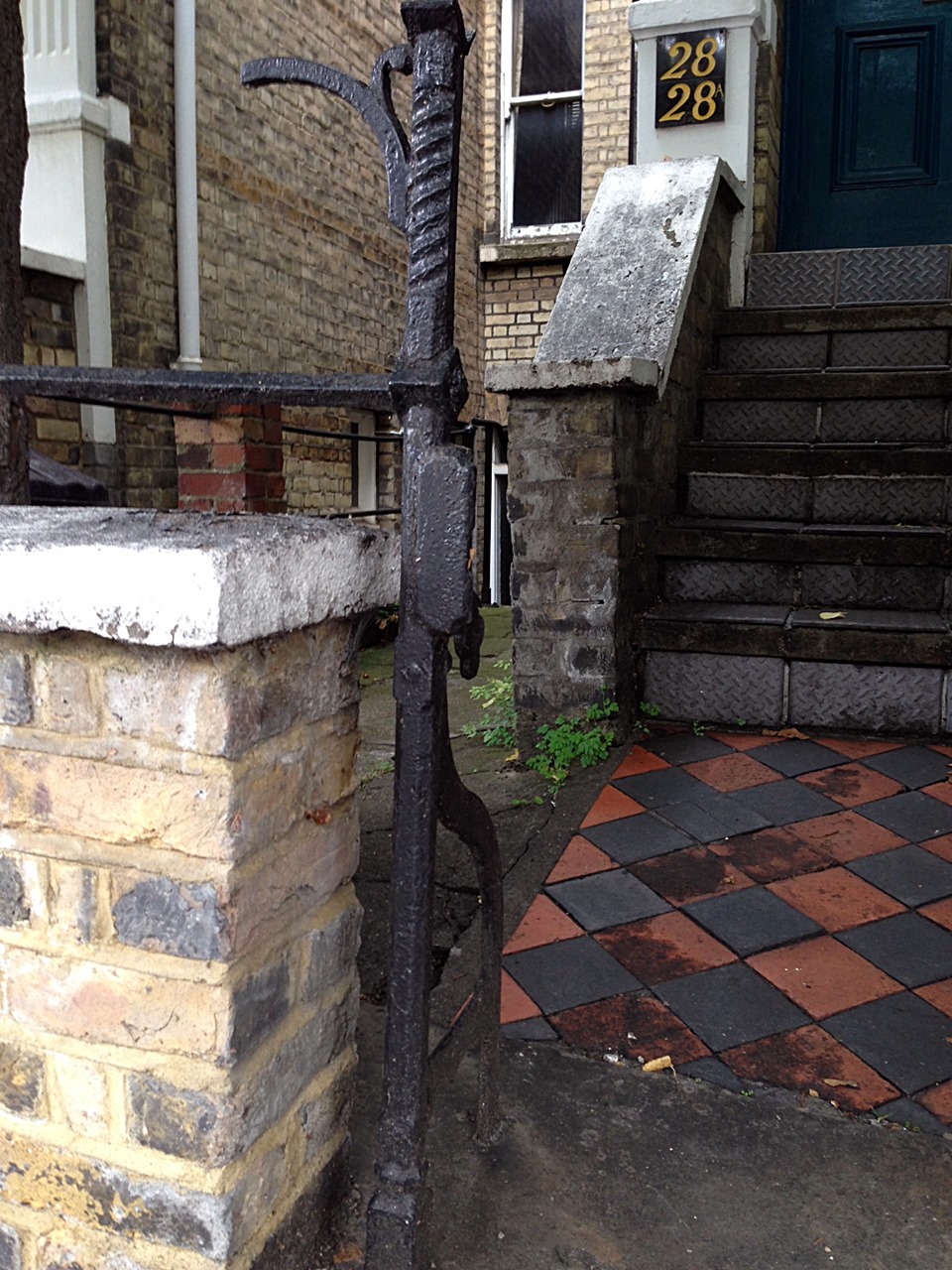victorian original wrought iron roll back gate with old York stone quarry tile path and original London Stock brick wall Putney West Hill London# (5)