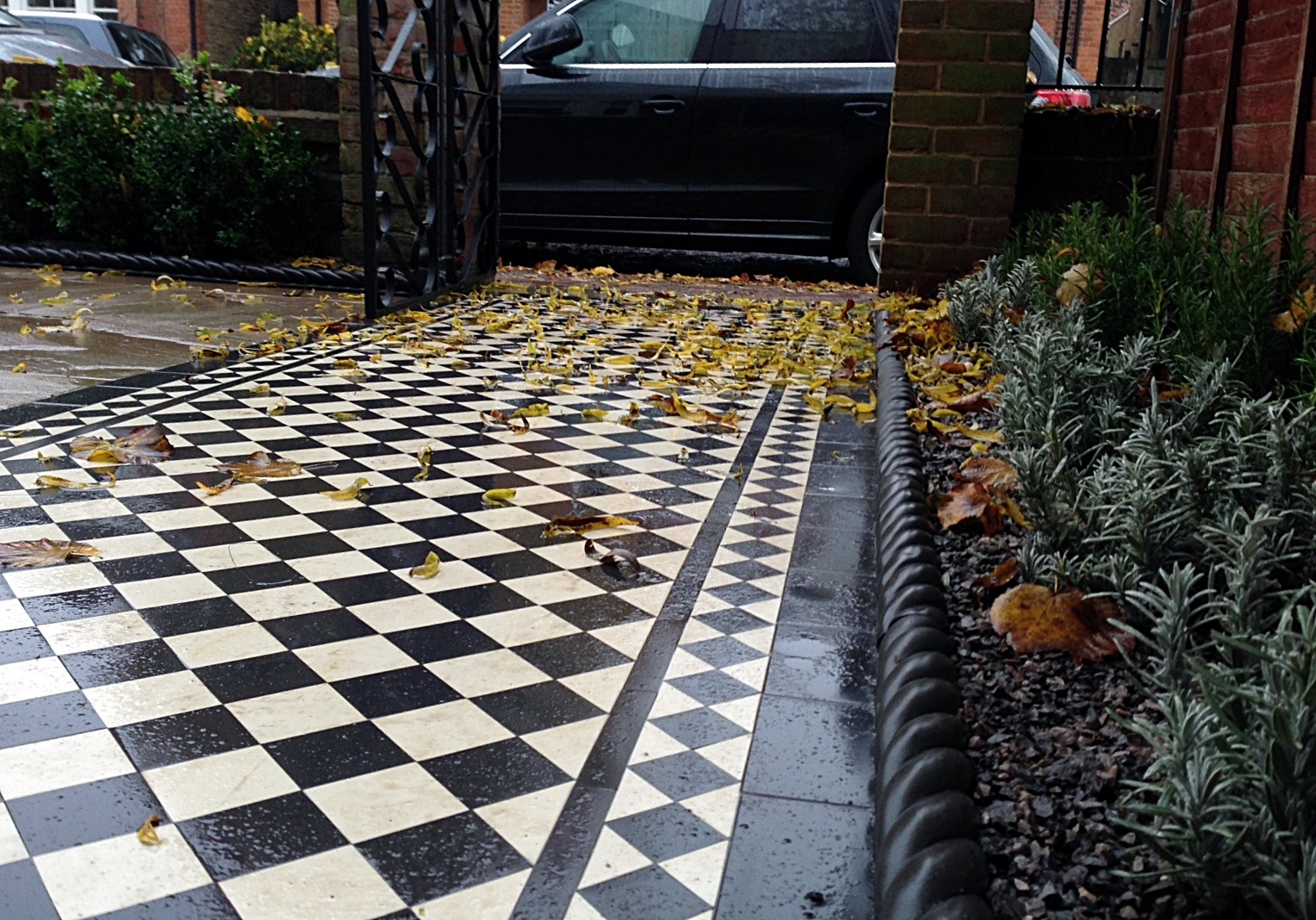 victroian black and white mosaic tile garden path paving formal planting buxus bay lavender edge tiles london (3)