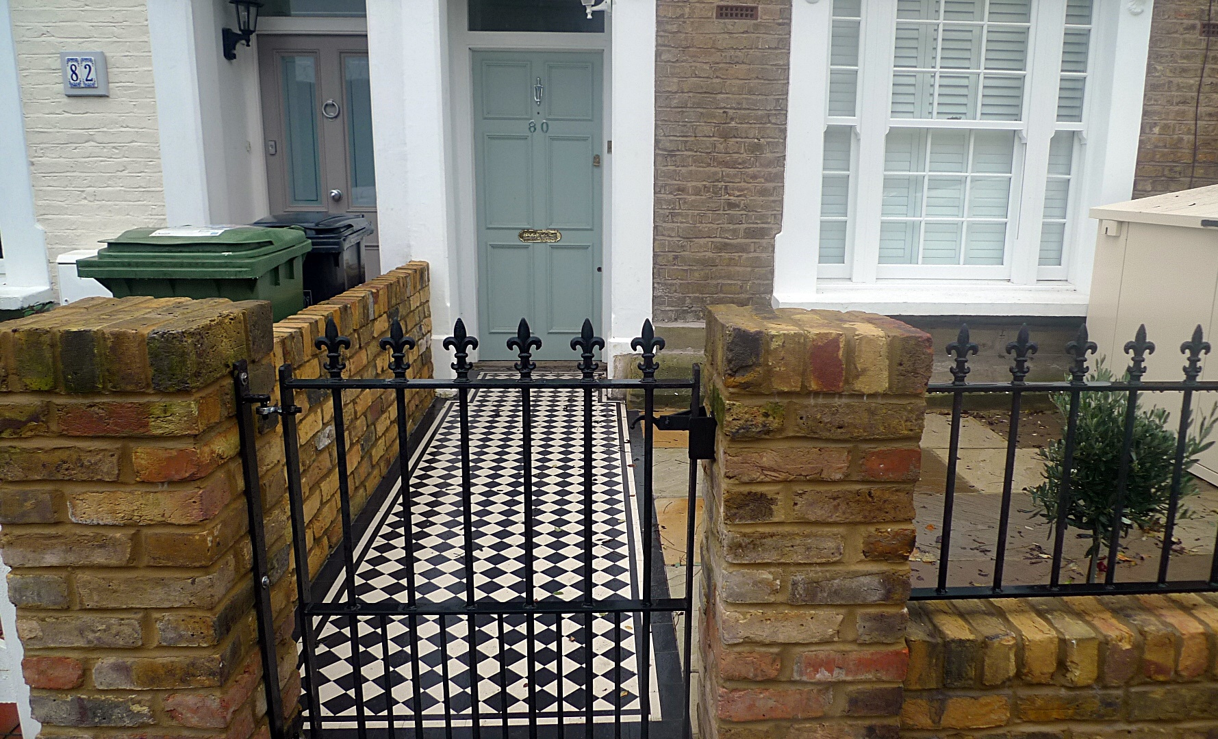 Classic garden multi colour Victorian mosaic brick wall London Wandsworth Clapham Balham