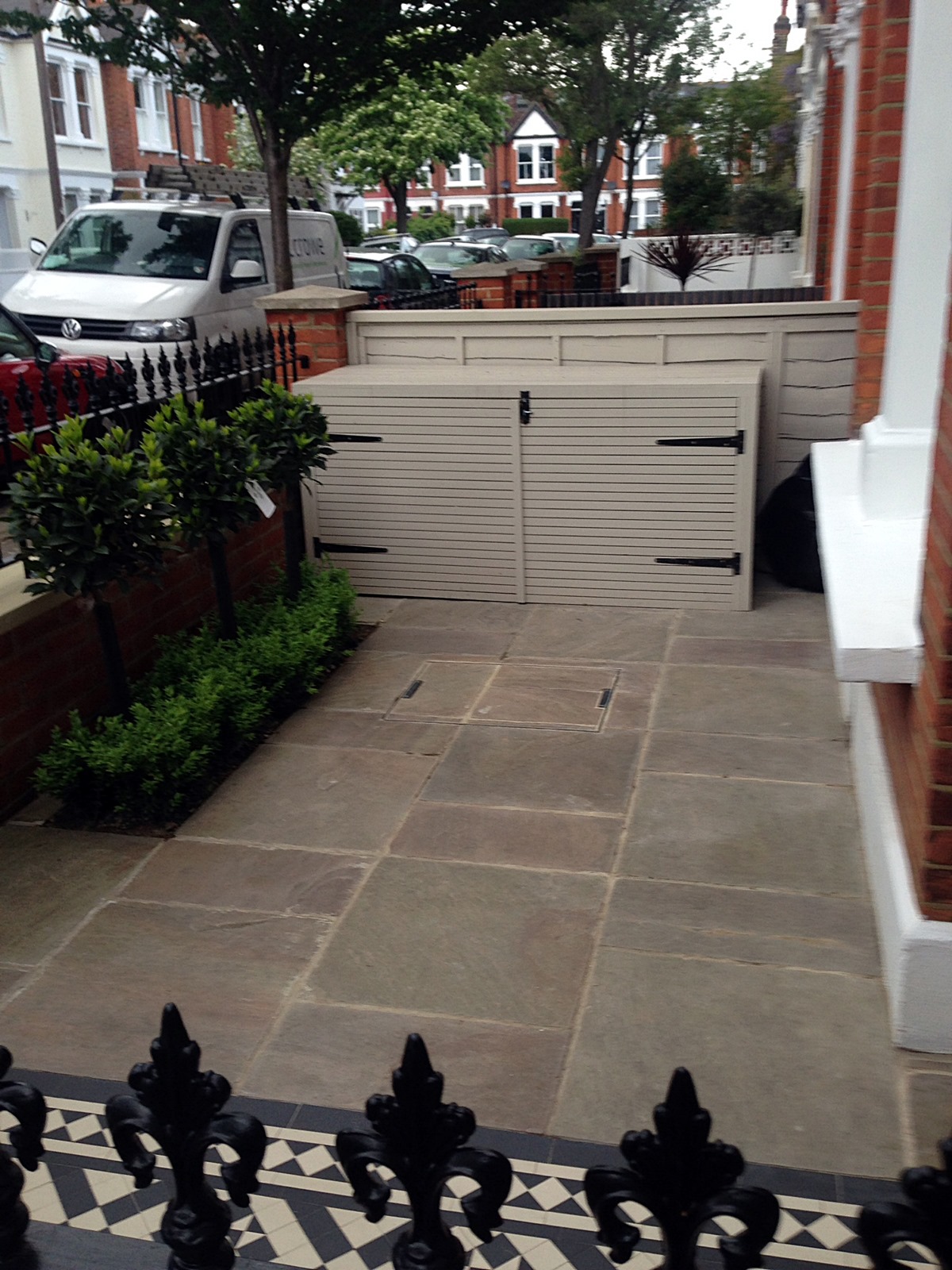 red brick front garden wall yellow stone caps sandstone paving victorian mosaic tile path chelsea west london