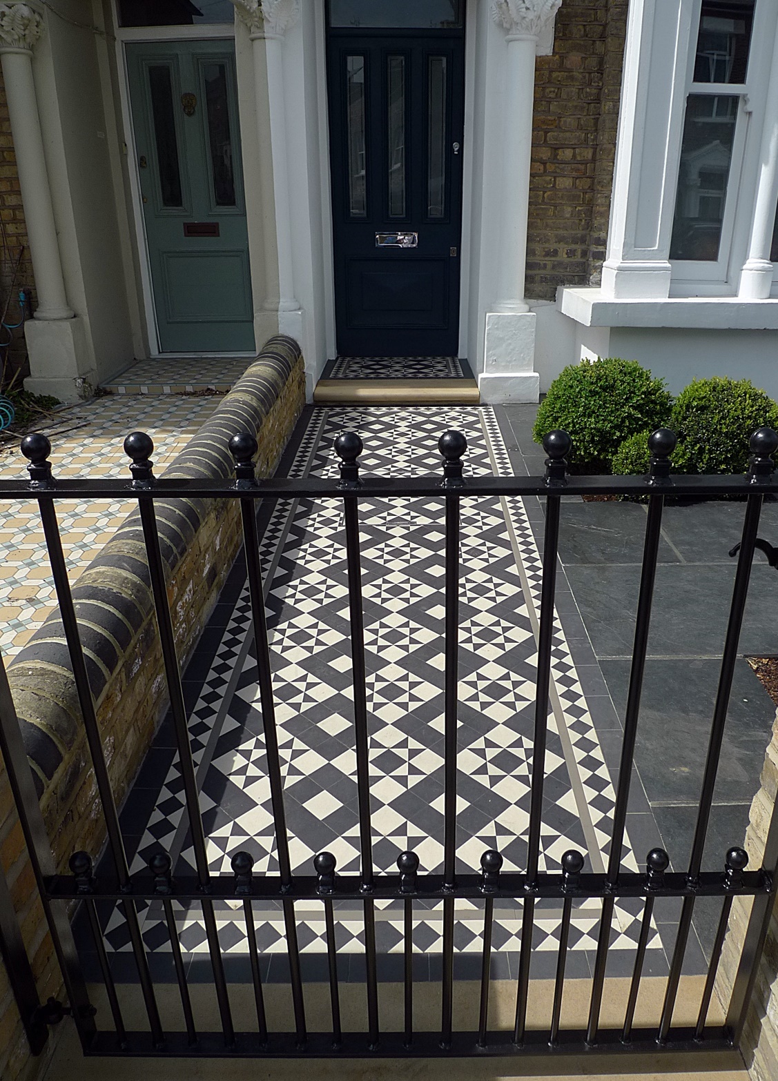 Metal gate rails path mosaic Victorian slate paving grey black white iron wrought London Cheslea Fulham Wandsworth Battersea