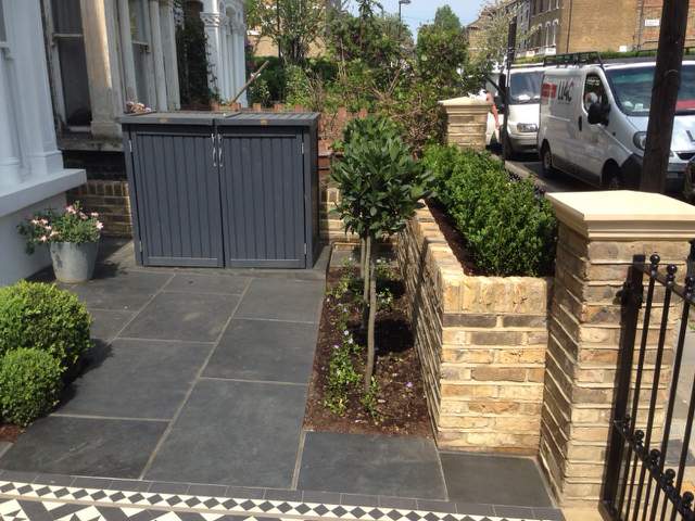 raised bed front garden wall london bin store topiary bay trees buxus