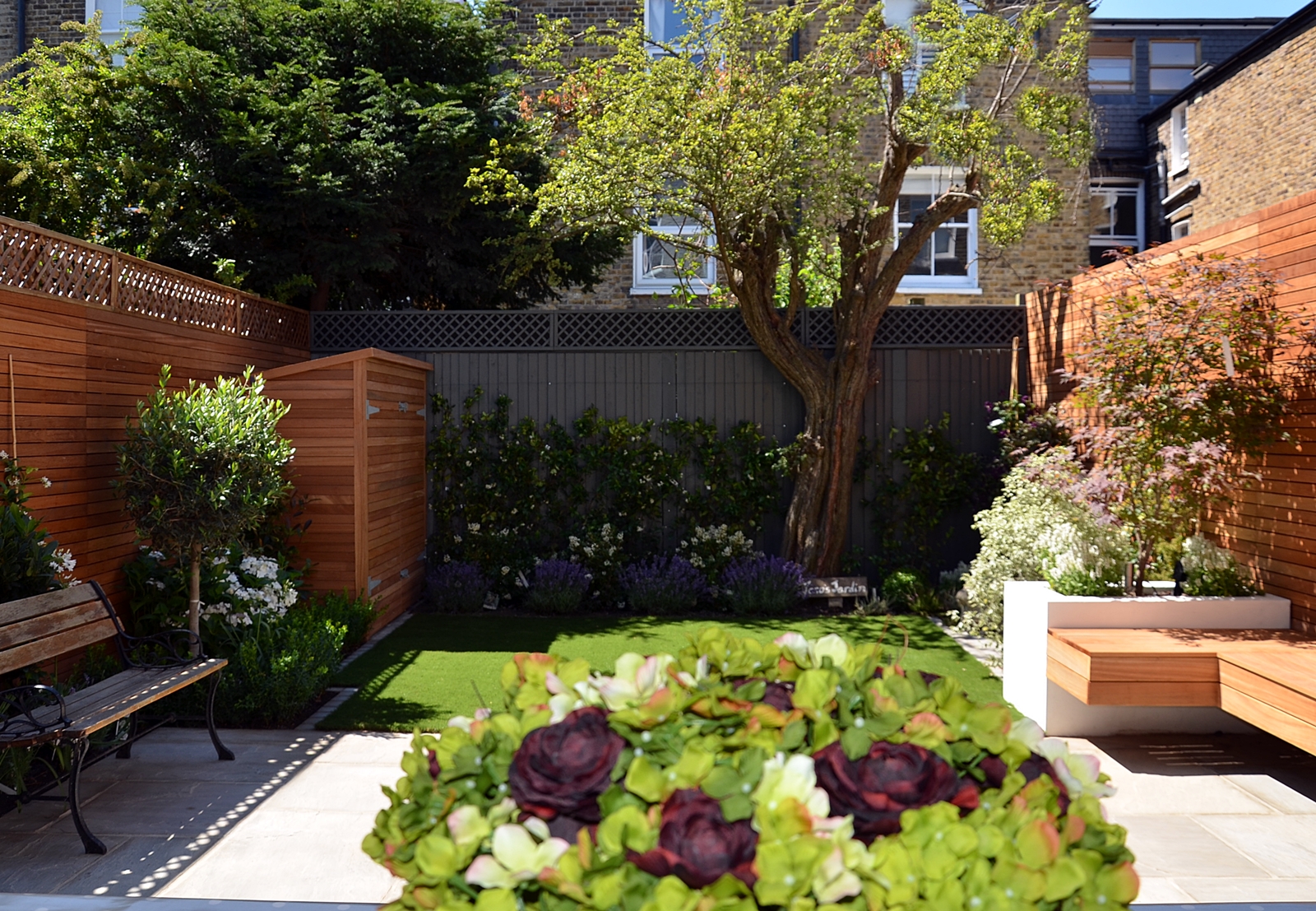 a garden view through bi folding doors london garden design designer